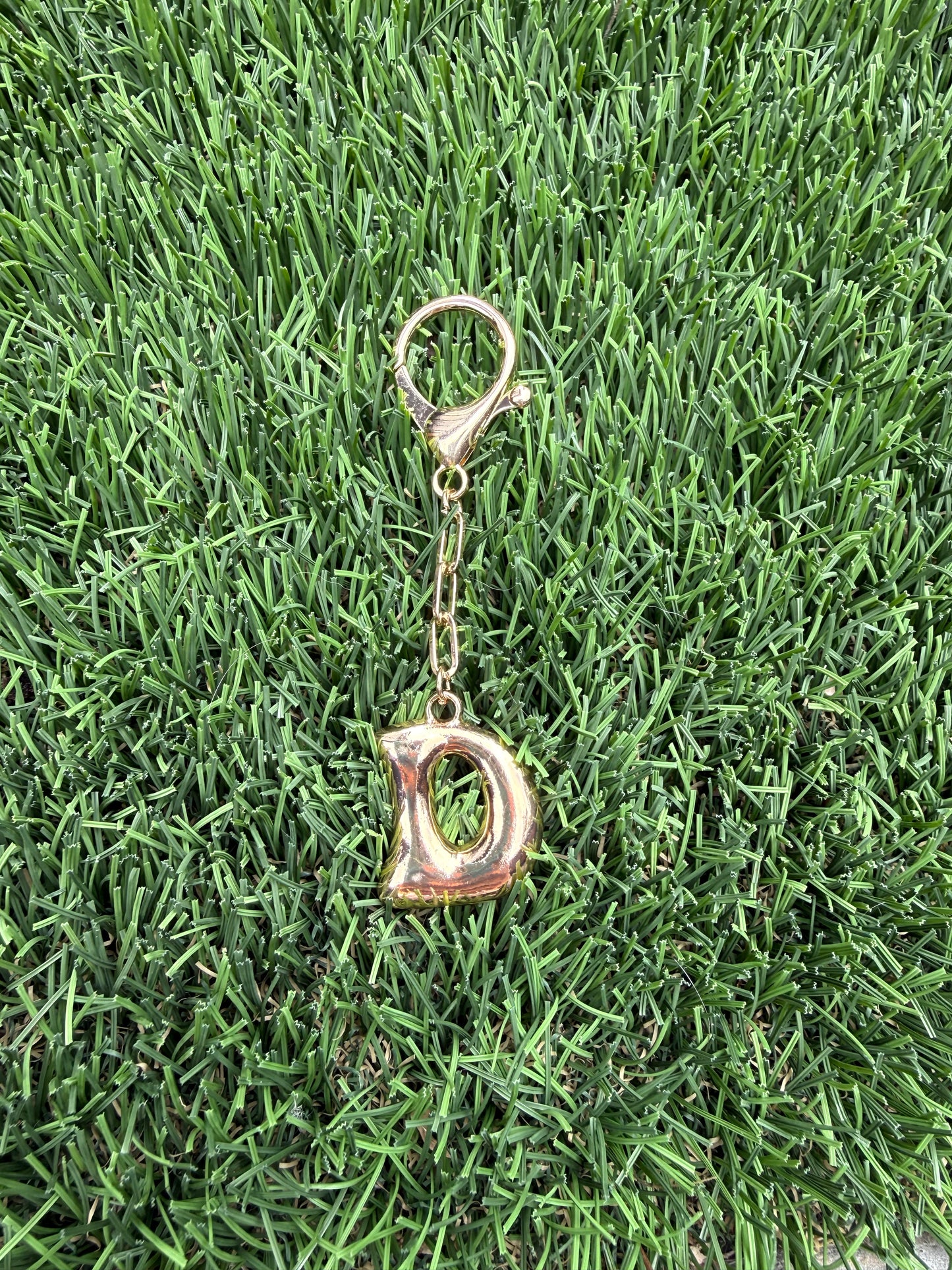 Gold Bubble letter charm