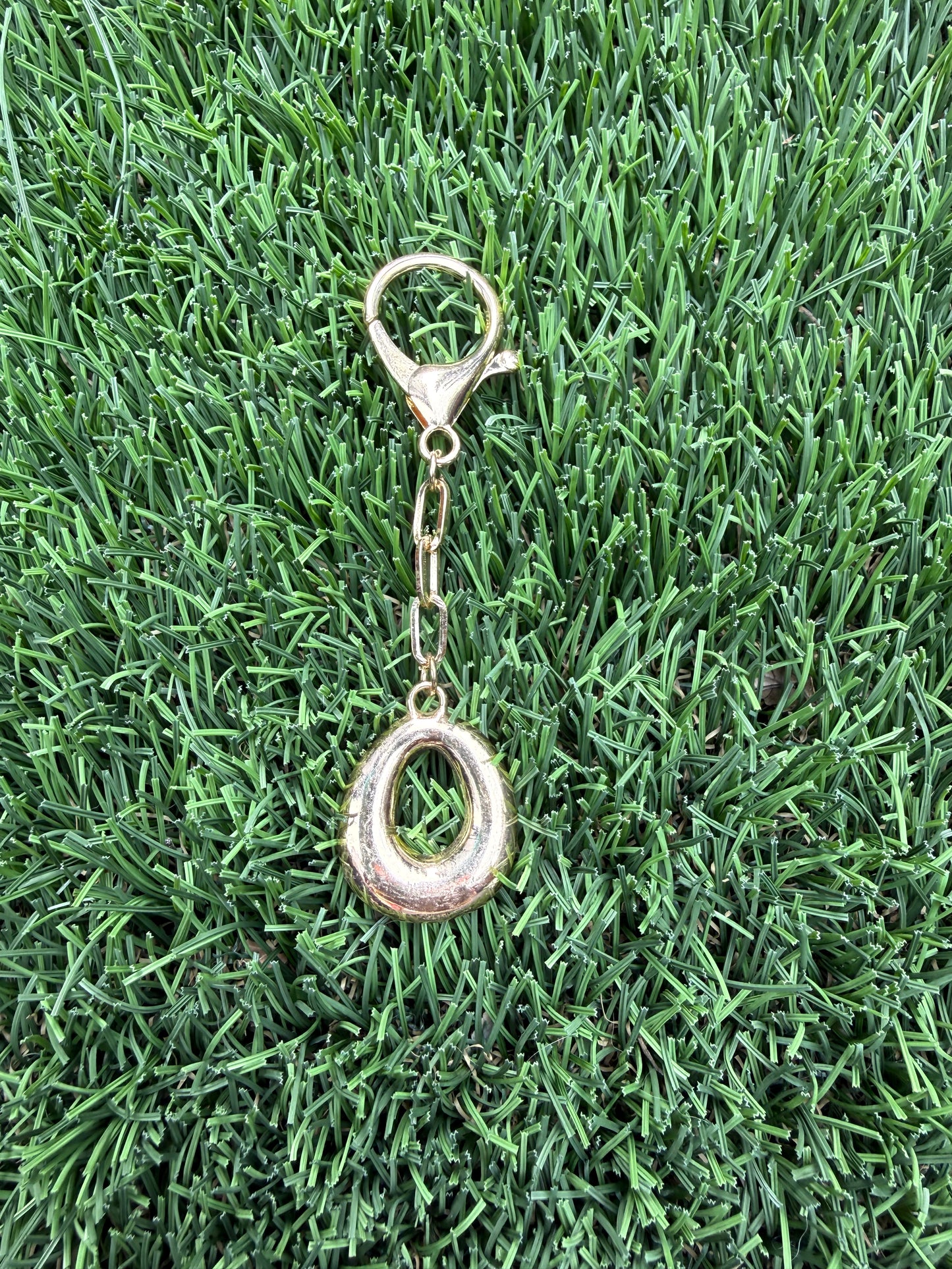 Gold Bubble letter charm