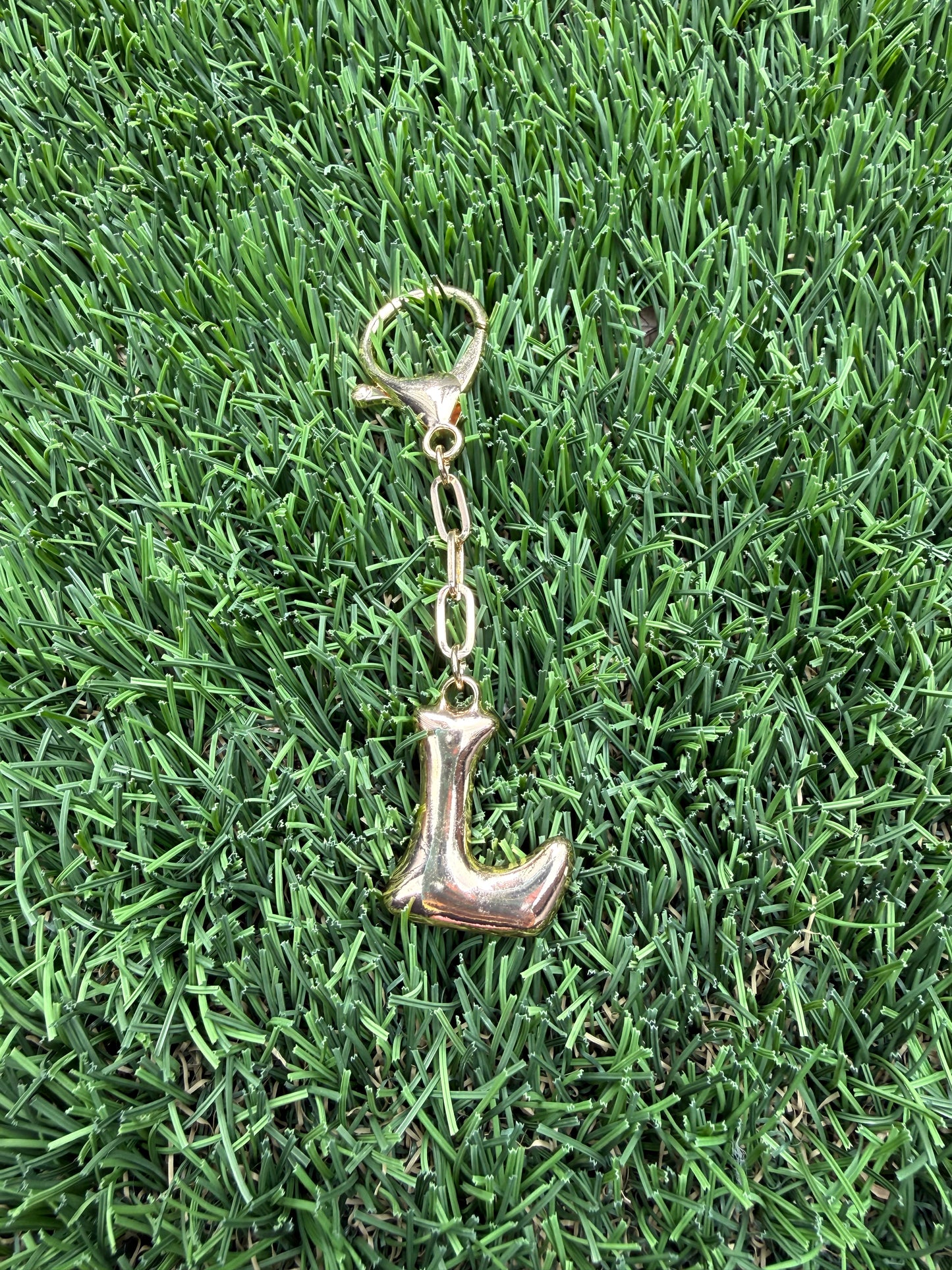 Gold Bubble letter charm