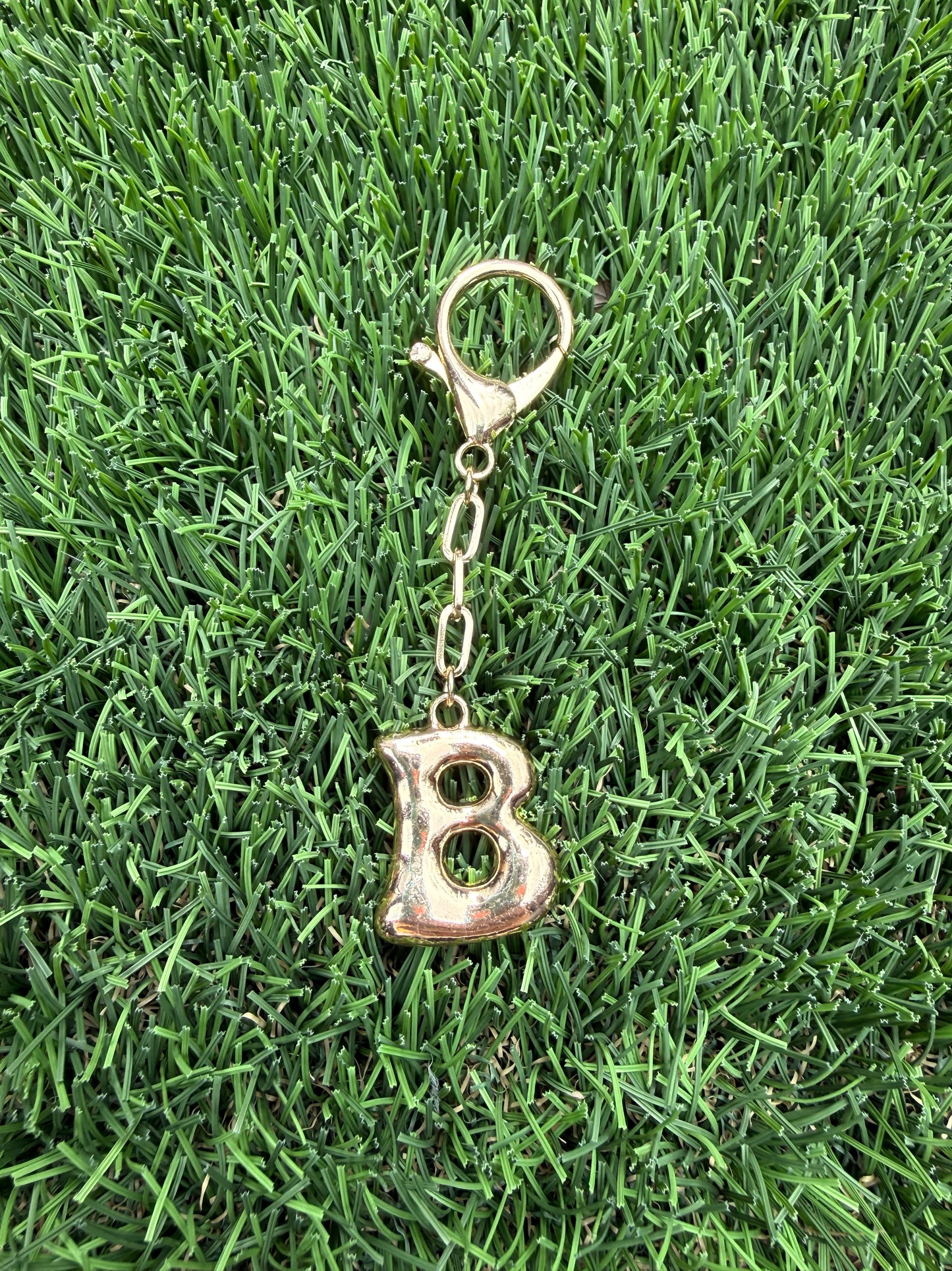 Gold Bubble letter charm