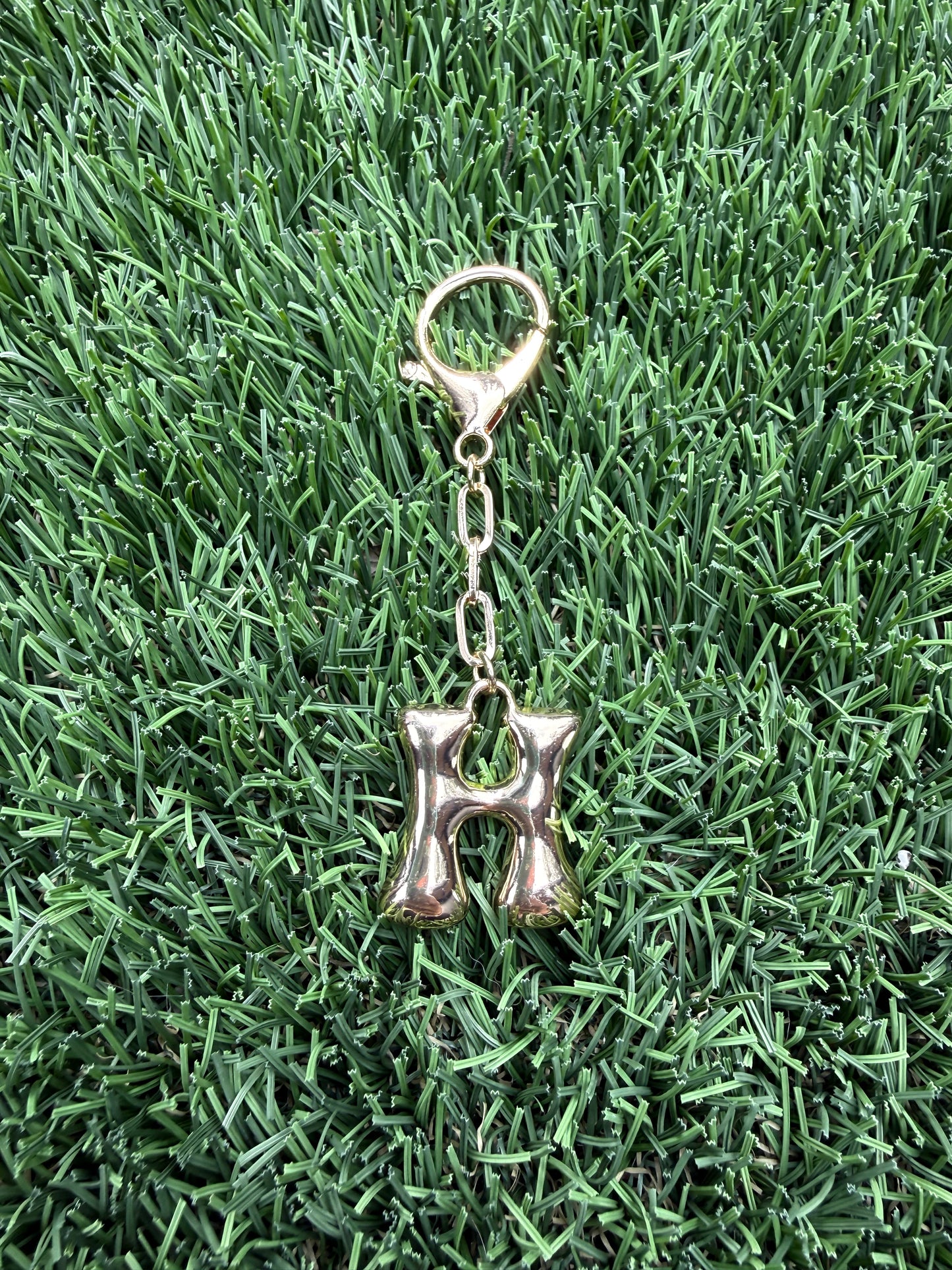 Gold Bubble letter charm