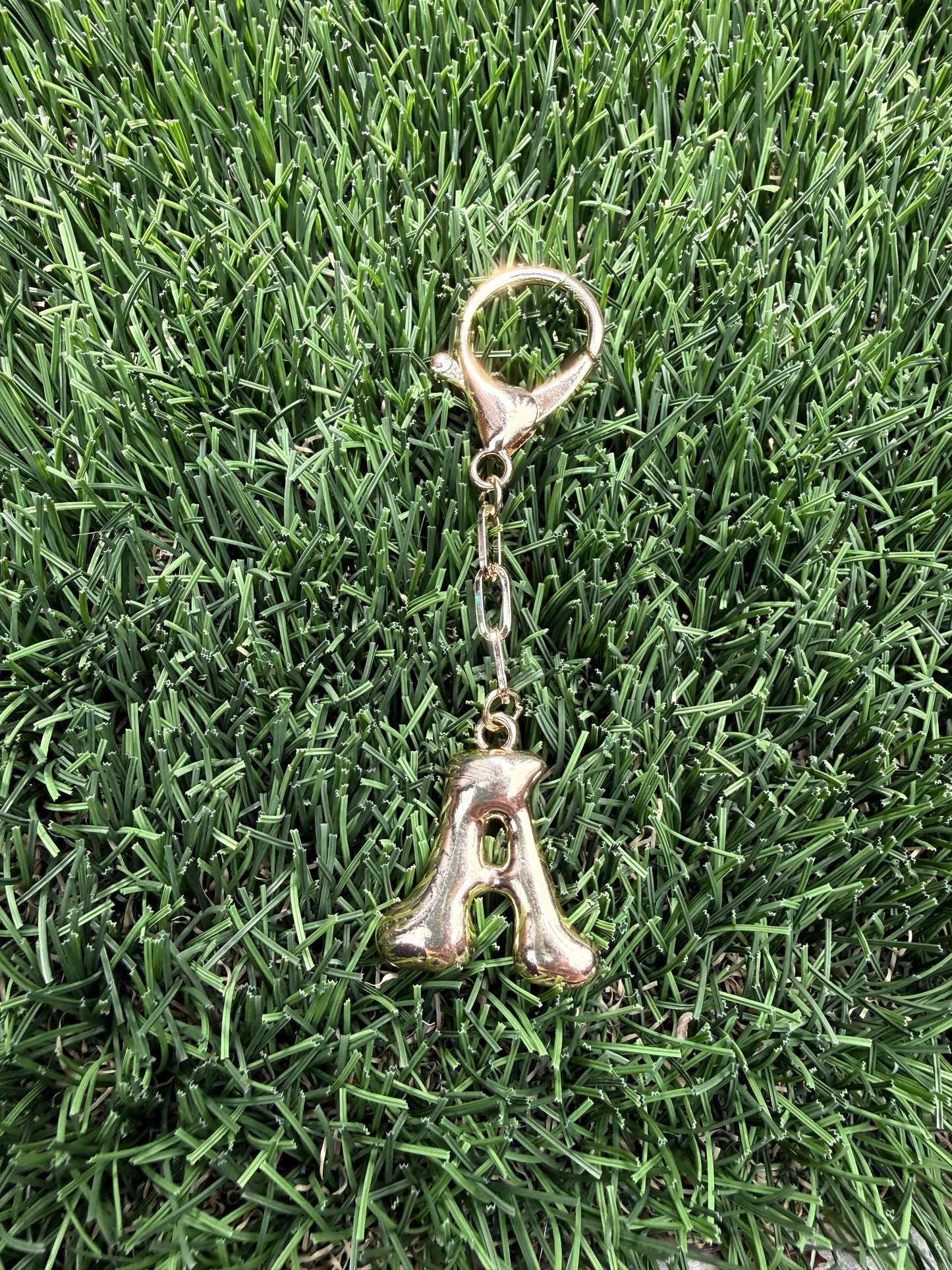 Gold Bubble letter charm