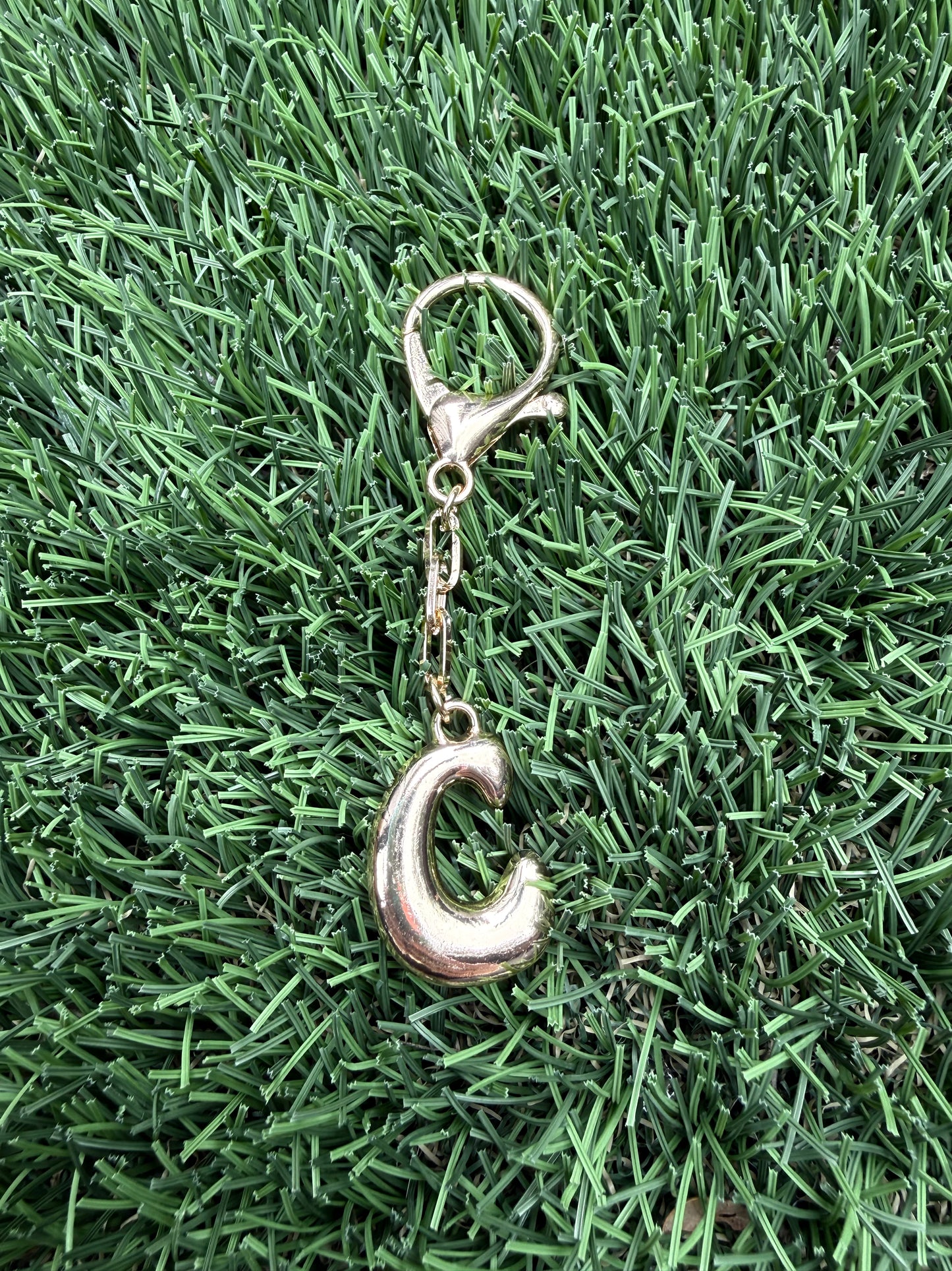 Gold Bubble letter charm